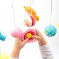 Koloto nad postlku se svtelnm projektorem Baby Mix erven